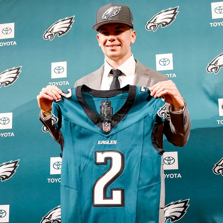 Eagles second-round pick Cooper DeJean holds his jersey after meeting with the media during a introduction press conference at the NovaCare Complex.