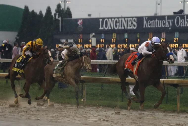 Mike Smith rides Justify to victory during the 144th Kentucky Derby at Churchill Downs on Saturday.