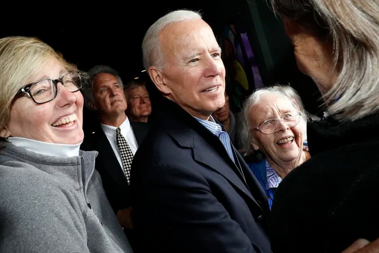 Former vice president and Democratic presidential candidate Joe Biden greets supporters during a campaign stop at the Community Oven restaurant in Hampton, N.H. Monday.
