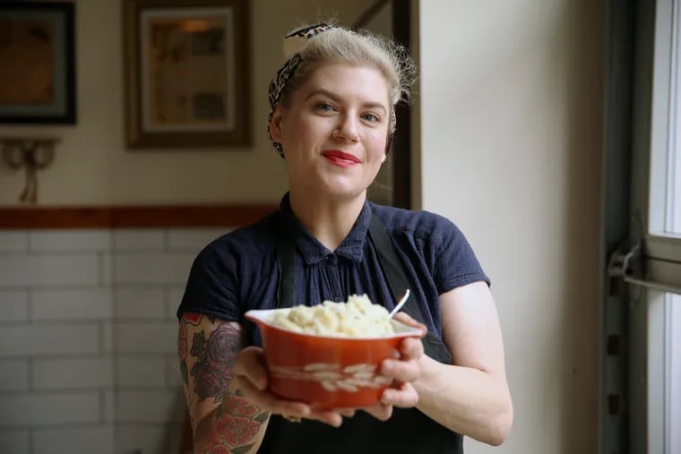 Owner Rachel Klein with her vegan roasted garlic mashed potatoes at Miss Rachel's Pantry in South Philadelphia. The recipe uses non-dairy butter, coconut milk, and soy milk.