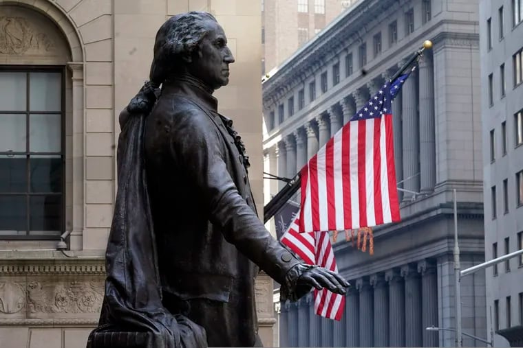 The Federal Hall statue of George Washington overlooks the New York Stock Exchange in 2021.