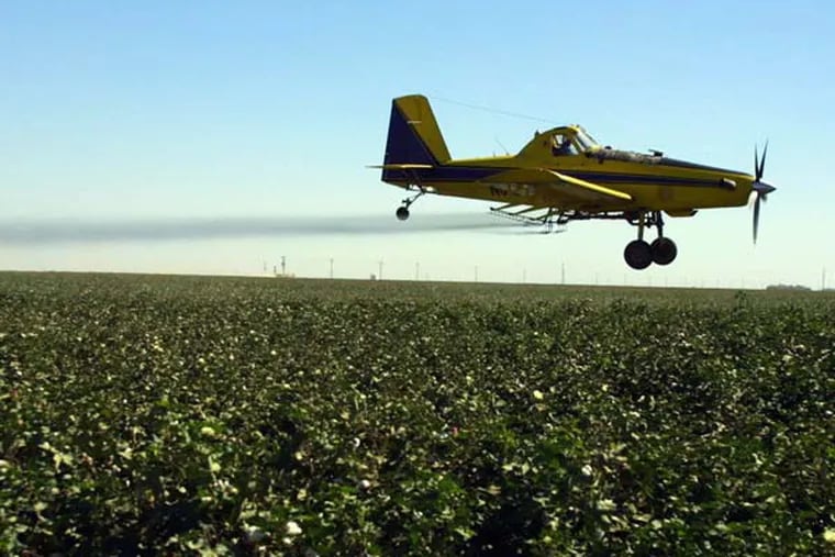 The pesticide industry will benefit from new farm bill. (AP Photo/Gary Kazanjian, FILE)