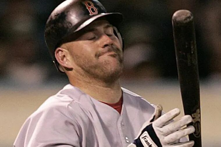 Kevin Youkilis reacts after striking out with the bases loaded against Oakland Athletics' Esteban Loaiza in the third inning of a baseball game Monday, Aug. 28, 2006, in Oakland, Calif. (Ben Margot/AP file)