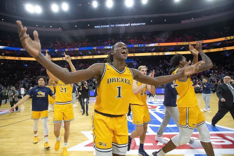 Lamar Oden of Drexel celebrates after the Dragons upset Villanova, 57-55, in the Big Five Classic on Saturday.