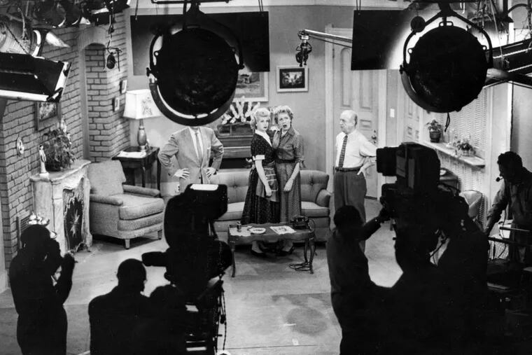 Three huge recent books on the history of television all say "I Love Lucy" (1951-1957; 1957-1960) is one of the greatest of all U.S. TV's scripted shows. Seen on set during production (left to right) are Desi Arnaz (partially obscured), Lucille Ball, Vivian Vance, and William Frawley.