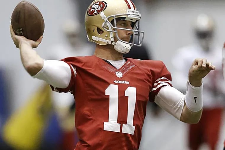 San Francisco 49ers quarterback Alex Smith passes during practice on
Wednesday, Jan. 30, 2013, in New Orleans. The 49ers are scheduled to
play the Baltimore Ravens in the NFL Super Bowl XLVII football game on
Feb. 3. (AP Photo/Mark Humphrey)
