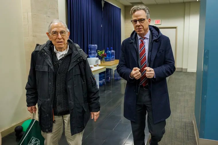 At left is Theodore Tapper and son Jake Tapper, CNN reporter arriving at a press conference at Philadelphia District Attorney’s office on Monday. Rice was convicted of a South Philadelphia shooting that took place in 2011, and prosecutors are no longer pursuing a case against him.
