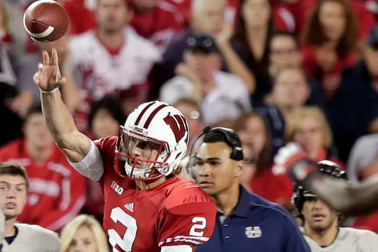 Wisconsin's Joel Stave, throwing against Utah State, has taken over at quarterback from turnover-prone Danny O'Brien. He will start against Texas-El Paso. MORRY GASH / Associated Press