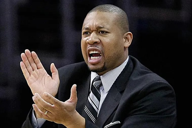 The 76ers are considering talking to Denver assistant Melvin Hunt about their coaching job. (Mark Duncan/AP file photo)
