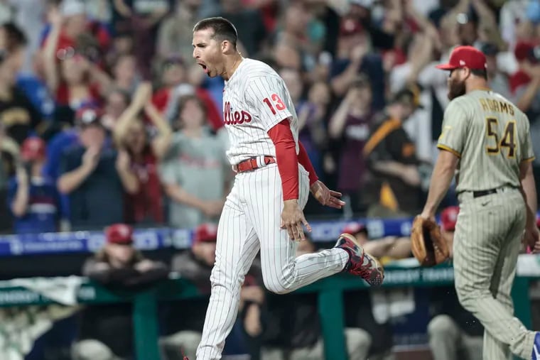 Brad Miller, the Phillies' top bat off the bench, celebrates after delivering a walk-off double against the San Diego Padres earlier this month at Citizens Bank Park.