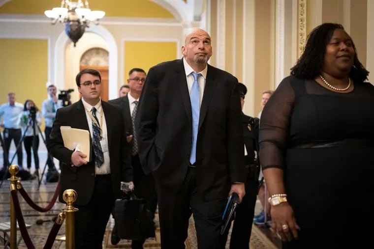Sen.-elect John Fetterman (D., Pa.) heads to a lunch meeting with Senate Democrats at the U.S. Capitol on Nov. 15.