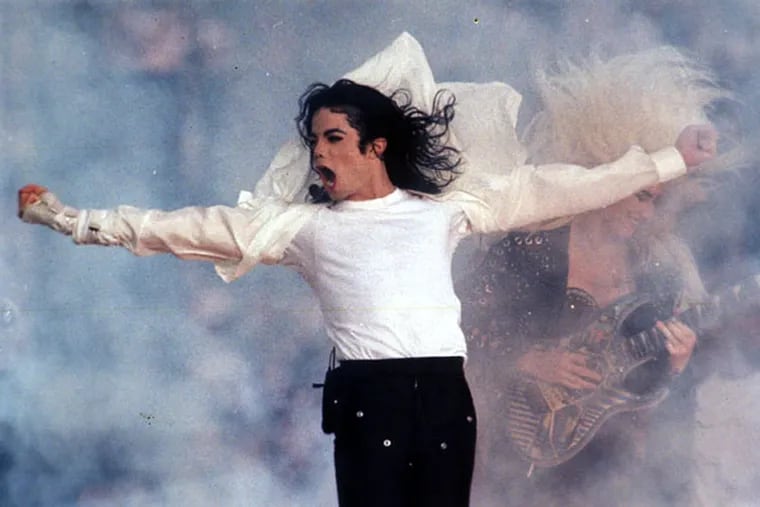 FILE - This Feb. 1, 1993 file photo shows Pop superstar Michael Jackson performing during the halftime show at the Super Bowl in Pasadena, Calif. Jackson's words and music rang through a courtroom once again on Monday, April 29, 2013, this time at the start of wrongful death trial, as a lawyer tried to show jurors the pop singer's loving relationship with his mother and children. (AP Photo/Rusty Kennedy, file)