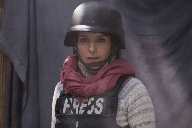 Live from Afghanistan: In &quot;Whiskey Tango Foxtrot,&quot; based on Chicago Tribune reporter Kim Barker's memoir &quot;The Taliban Shuffle,&quot; Tina Fey plays a broadcast journalist named Kim Baker who accepts an assignment to the war zone.