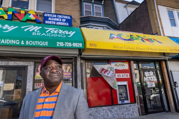 Southwest Philly small business owners have organized to improve the community, which includes many West African immigrant merchants.  Photograph of Musa Trawally, director of Community and Business Development for ACANA, the African Cultural Association of North America, at 5530 Chester Avenue in Philadelphia, on Tuesday, March 29, 2022.