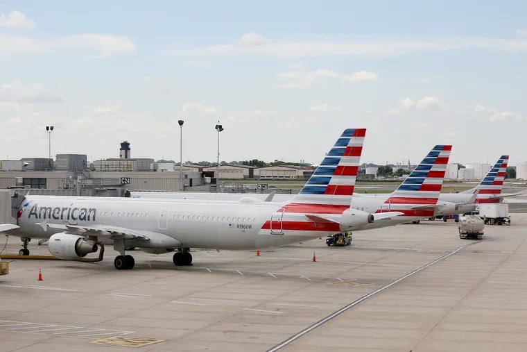 Planes sit at gates at Philadelphia International Airport on Tuesday, June 30, 2020.