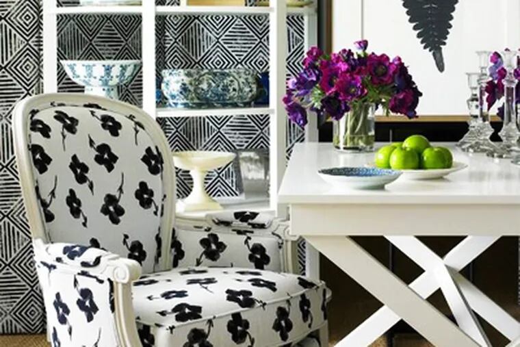 A chair covered in Sunbrella fabric, which is made by Glen Raven of North Carolina, is easy to clean and durable.