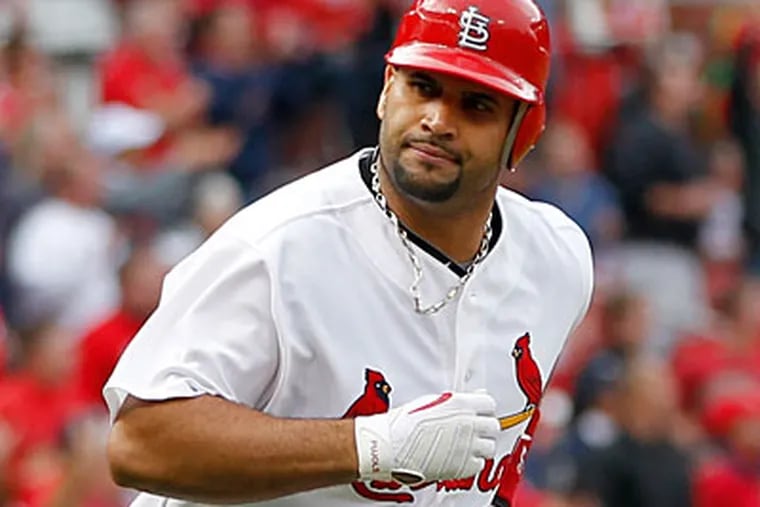 The Marlins are reportedly offering over $200 million to sign first baseman Albert Pujols. (Jeff Roberson/AP Photo)