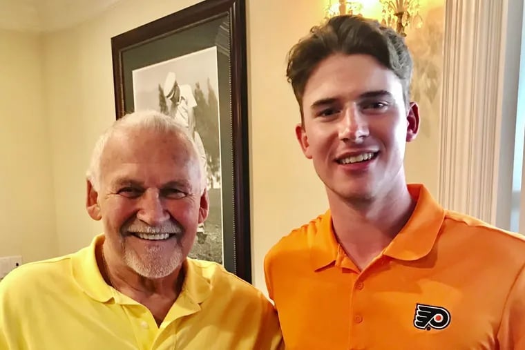 Hall of Fame goaltender Bernie Parent (left) with Flyers goalie Carter Hart at a golf tournament before the season. Parent believes the Flyers and Hart can make a serious Stanley Cup run.
