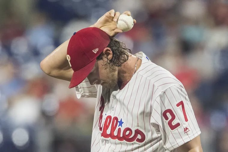 Aaron Nola had a rough first inning, giving up three runs to the Nationals.
