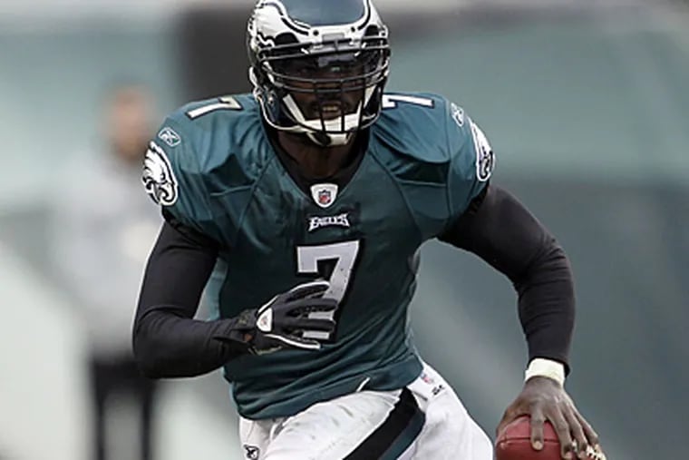 Michael Vick's stats per game decreased in every major category last season. (Yong Kim/Staff Photographer)