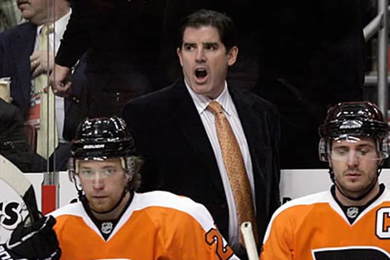 "There's still a lot of work to be done," Peter Laviolette said about the Flyers. (Yong Kim/Staff Photographer)