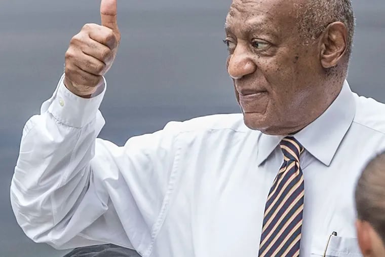 Bill Cosby gives a thumbs up outside Montgomery County Courthouse on Wednesday, the third day of jury deliberation in his sex-assault case.