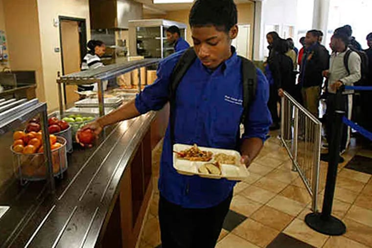 Nutrition fights for a place at the table at many schools, but at High School of the Future, Shawn Simon augments lunch with fruit. (Michael S. Wirtz / Staff)