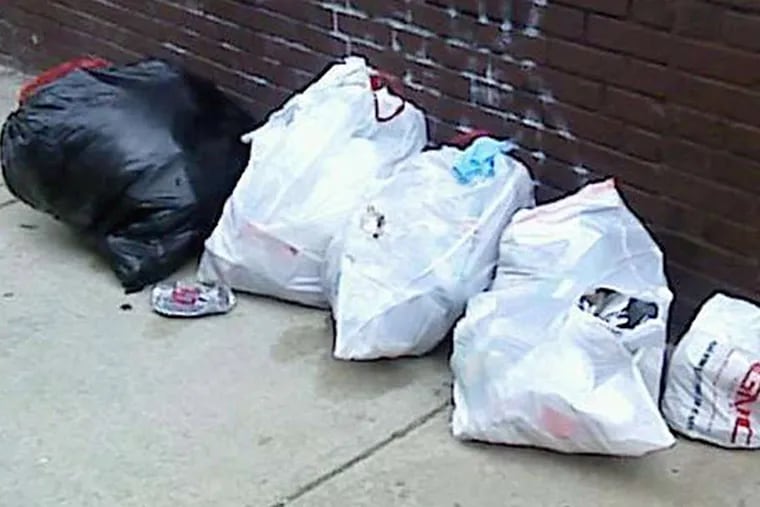 A collection of trash found on a sidewalk in Queen Village. (Photo provided)