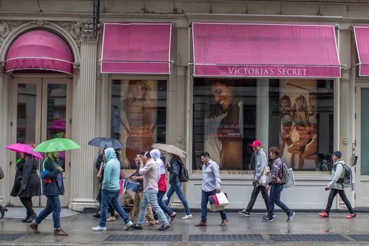 Shoppers walk past the Victoria's Secret store on Broadway in the Soho neighborhood of New York. As online advertising and shipping costs rise, having a brick-and-motor location might be cheaper.