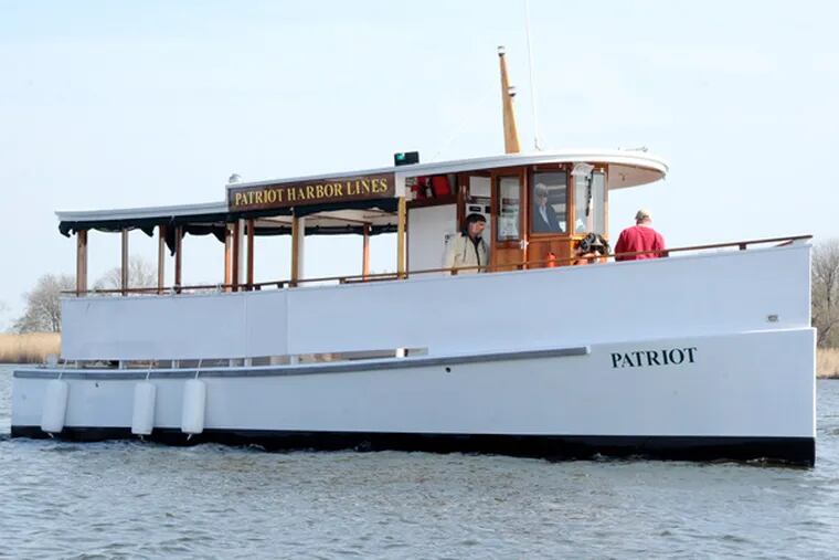 The Patriot, a replica of a 1920s boat, will begin tours on the Schuylkill in May. Cruises will include Bartram’s Garden. (Clem Murray / Staff Photographer)