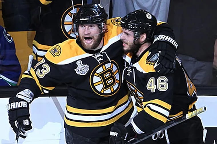 Boston's eight goals were the most scored by a team in a Stanley Cup finals game since 1996. (Jonathan Hayward/The Canadian Press/AP)