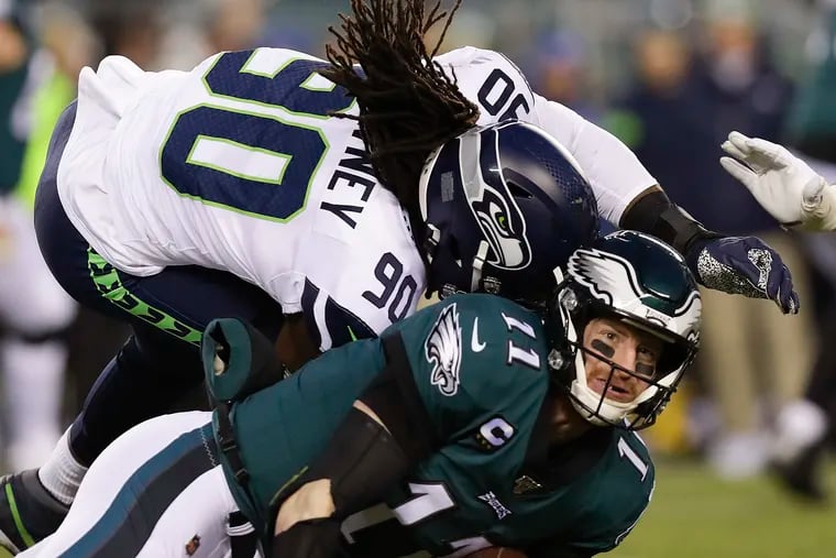 “It’s unfortunate,” Eagles coach Doug Pederson said of Jadeveon Clowney's helmet-to-helmet hit on Carson Wentz in the Eagles-Seahawks game. "It’s part of our game. It happens. It gets missed."