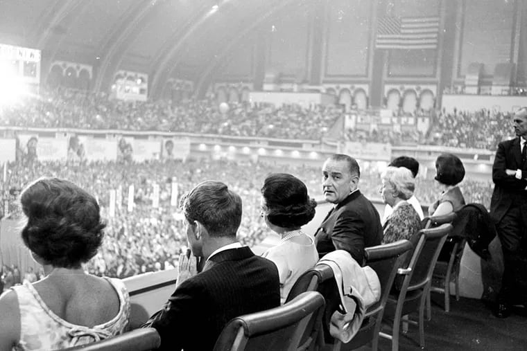 This is the view President Lyndon Johnson and his guests had of the closing session of the Democratic convention in Atlantic City, August 27, 1964.  Left to right:  Ethel Kennedy and her husband, Robert F. Kennedy; Mrs. Johnson, the President, Mrs. Hubert Humphrey, Luci Johnson, and Lynda Johnson.  (AP Photo/John Rous)