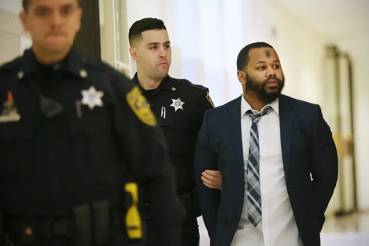 Keenan Jones, a Philadelphia man who allegedly shot five people at a Walmart in August 2018, is escorted into a courtroom inside the Montgomery County Courthouse in Norristown. Jones is accused of opening fire at the store in Cheltenham Township and then fleeing the scene.