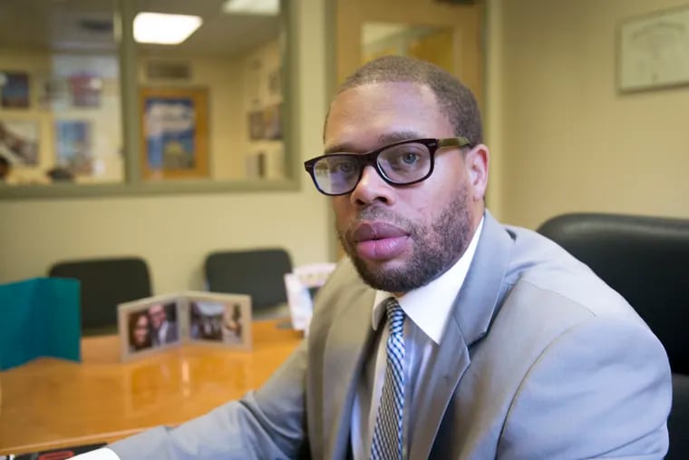 Timothy Welbeck, the civil rights attorney at Philadelphia's Council on Islamic-American Relations, sits in his office on the morning of Friday, July 20, 2018. Reports of anti-Muslim bullying to his office have increased since 2014.