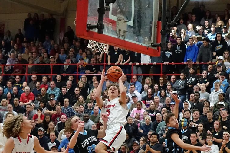 Haddonfield’s Mike DePersia goes up for a driving layup against Lower Cape May.
