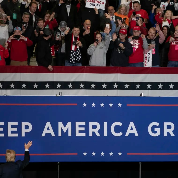 Then-President Donald Trump exits and acknowledges the crowd after a Keep America Great campaign rally in Wildwood, N.J., in 2020.