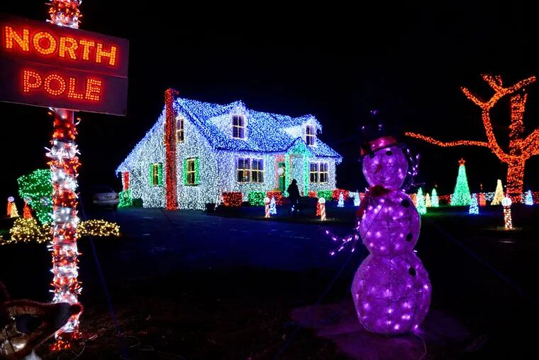 This eye-popping display has grown over the years. Amber Merefield, who inherited the decorating gene from her parents, estimates she has spent $18,000 on lights and decorations.