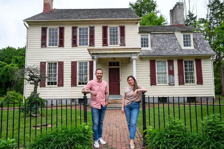 New owners Jeniphur and Michael Pasquarello outside Boxwood Hall on Haddon Avenue in Haddonfield. They plan to renovate the home built in 1799 by John Estaugh Hopkins into a small inn and restaurant with landscaped grounds.