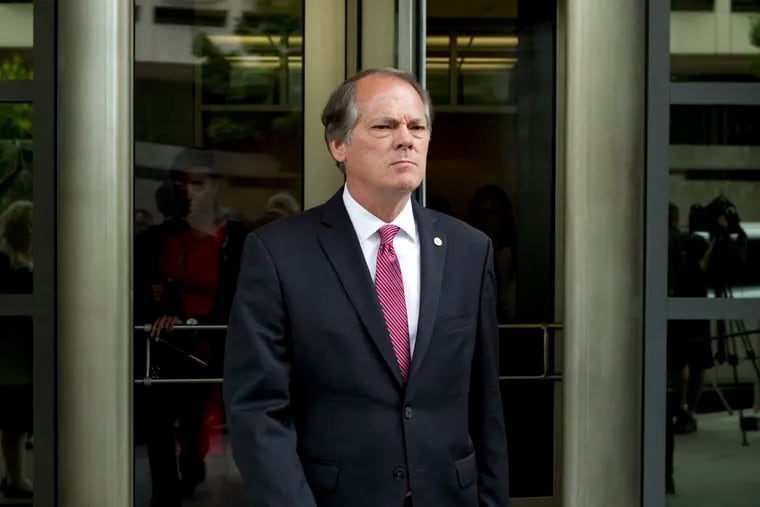 FILE - In this June 13, 2018, file photo, James Wolfe former director of security with the Senate Intelligence Committee leaves the federal courthouse in Washington. Wolfe will serve two months behind bars after he admitted to lying to the FBI. James Wolfe was sentenced Thursday, Dec. 20, in federal court in Washington and will also have to serve four months of supervised release. (AP Photo/Jose Luis Magana, file)