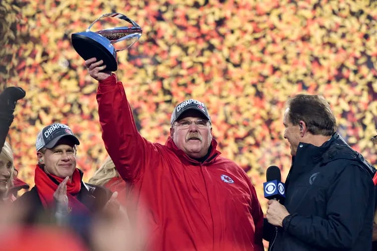 Kansas City Chiefs head coach Andy Reid holds the Lamar Hunt Trophy after the NFL AFC Championship football game against the Tennessee Titans Sunday, Jan. 19, 2020, in Kansas City, MO. The Chiefs won 35-24 to advance to Super Bowl 54. (AP Photo/Ed Zurga)