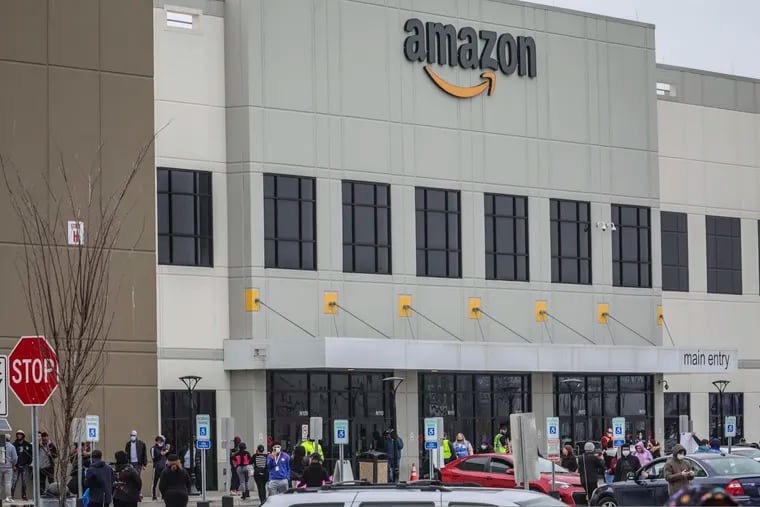 Workers at Amazon's fulfillment center in Staten Island, N.Y., protest work conditions in late March.