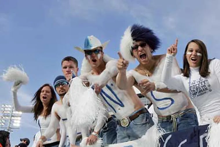 Penn State fans cheer before kickoff of their homecoming game against Michigan at Beaver Stadium on Saturday. (Barbara L. Johnston / Staff Photographer)