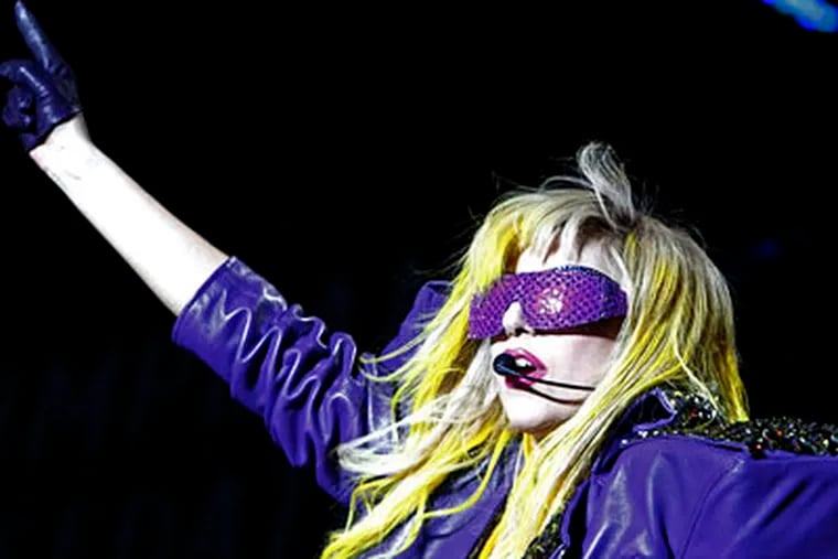 Lady Gaga performs during the fifth annual concert festival at Lollapalooza in Grant Park Friday, Aug. 6, 2010., in Chicago. (AP Photo/Nam Y. Huh)