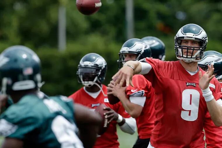 Nick Foles (9) throws a pass during NFL football practice at the team's training facility, Thursday, June 6, 2013, in Philadelphia. (Matt Rourke/AP file)
