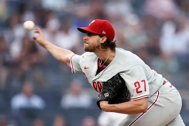 Philadelphia Phillies pitcher Aaron Nola throws during the first inning of the team's baseball game against the New York Yankees on Tuesday, July 20, 2021, in New York. (AP Photo/Adam Hunger)