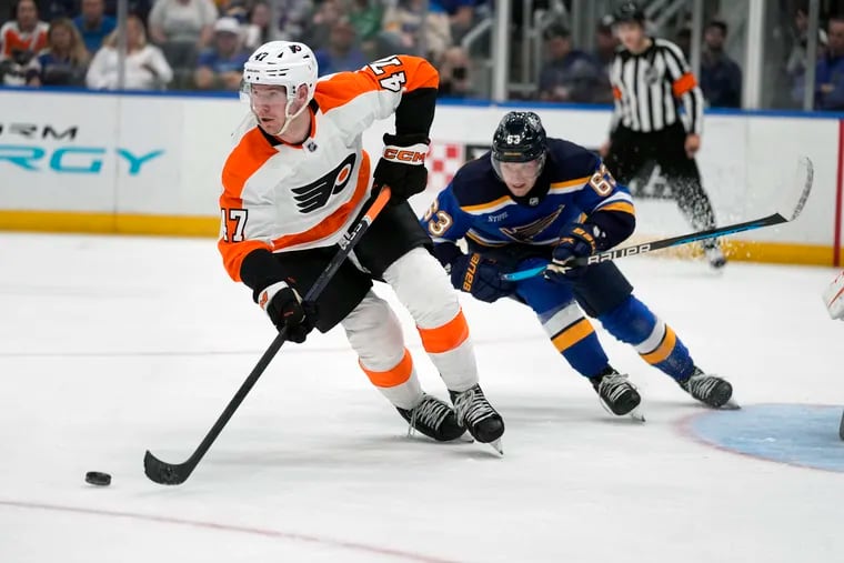 Defenseman Ronnie Attard in action for the Flyers against Jake Neighbours (63) and the St. Louis Blues on April 4. Attard played in two games for the Flyers last season.