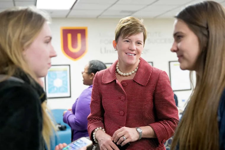 (Left to Right) Student Sydney Dickson, Missy Bryant, Assistant Dean of Student Affairs and Co-Director of the Ursinus Institute for Student Success, and student Helen Brabant-Bleakley, gather at the institute during an informational event, on Ursinus campus in Collegeville, Pennsylvania, Wednesday, March 29, 2017.