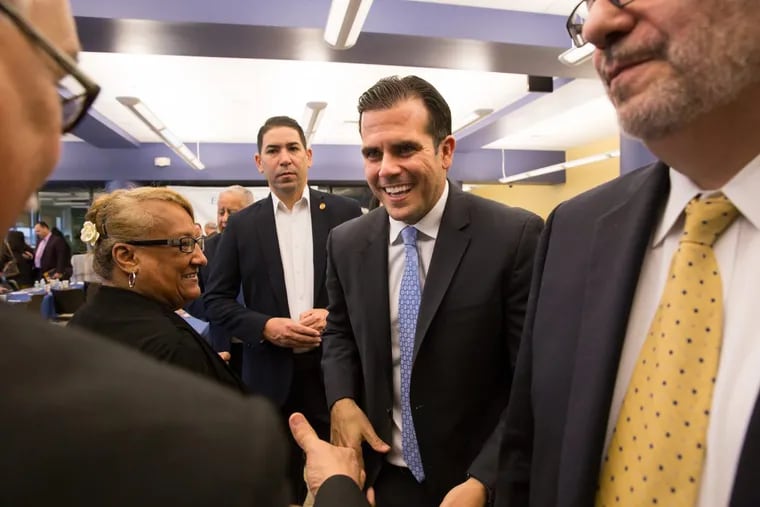 Gov. Ricardo Rossello, Governor of Puerto Rico, greets attendees after participating in a forum question and answer session at Esperanza College, in Philadelphia on Feb. 16.