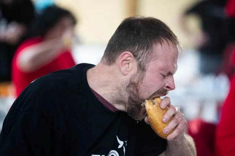 Dan “Killer” Kennedy shows his winning form at the Cheesesteak Bowl at Splash Swim Club. Delco Steaks of Broomall sponsored the spectacle on National Cheesesteak Day.